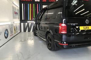 transporter-limo-tinted-glass-rear-panels-for-privacy Window Tinting